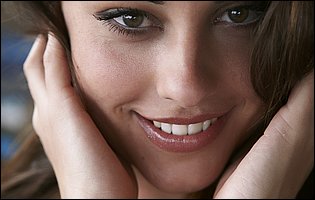 Pretty brunette Lorena Garcia loves posing naked for camera