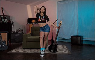 Abella Danger in t-shirt, shorts and sneakers stripping and exposing her hot body