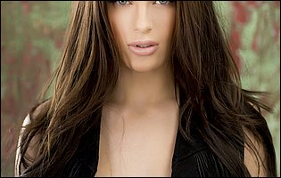 Gorgeous brunette Lana Rhoades in sexy black lingerie posing for camera