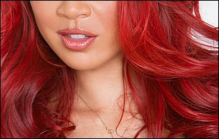 Hot asian redhead Mia Lelani strips for camera